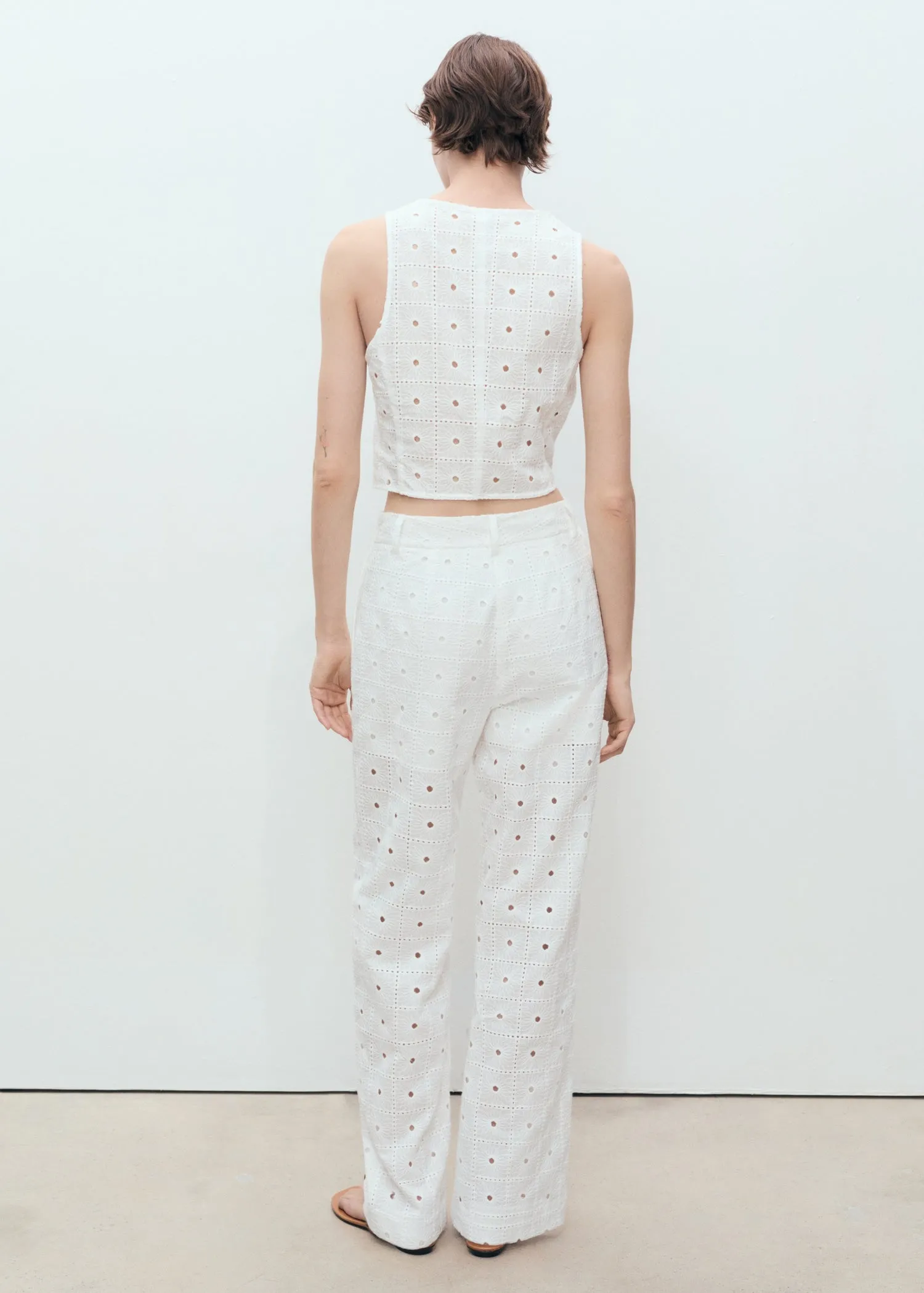Embroidered cotton waistcoat with bows